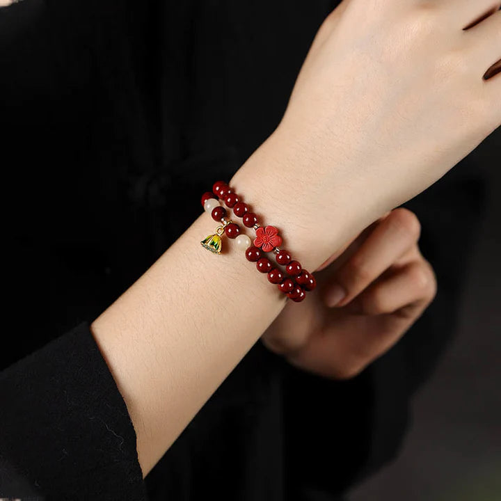 Wrapped in Light – Cinnabar & Lotus Protection Bracelet