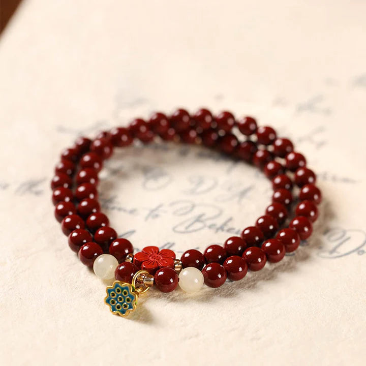 Wrapped in Light – Cinnabar & Lotus Protection Bracelet
