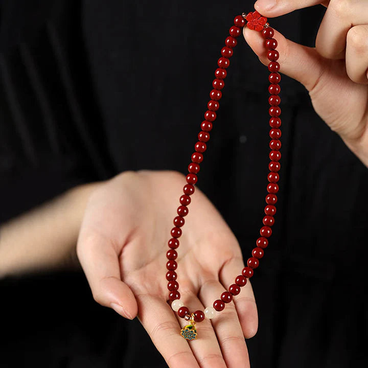 Wrapped in Light – Cinnabar & Lotus Protection Bracelet