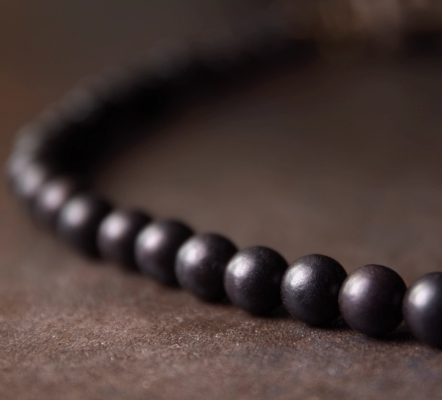 Tibetan Dzi & Ebony Guardian Bracelet